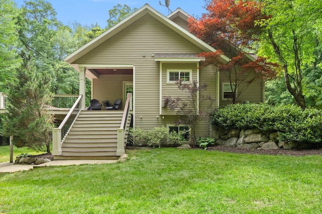 8702 E 98th St, Howard City, MI 49329 - view of front of home with stairs and a front yard