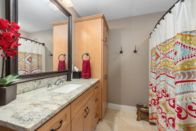 8702 E 98th St, Howard City, MI 49329 - full bathroom featuring vanity and tile patterned flooring