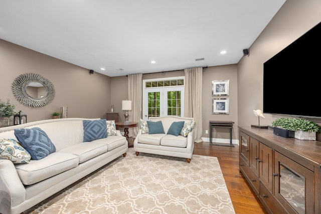 8702 E 98th St, Howard City, MI 49329 - living area featuring wood finished floors and recessed lighting