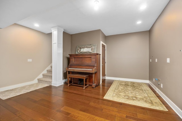 8702 E 98th St, Howard City, MI 49329 - sitting room featuring hardwood / wood-style floors, recessed lighting, and stairway