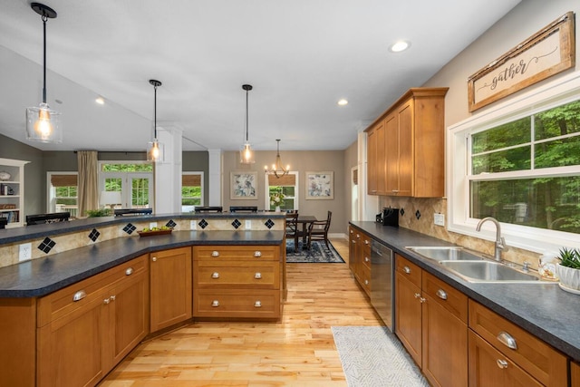 8702 E 98th St, Howard City, MI 49329 - kitchen featuring light wood finished floors, plenty of natural light, dark countertops, and recessed lighting