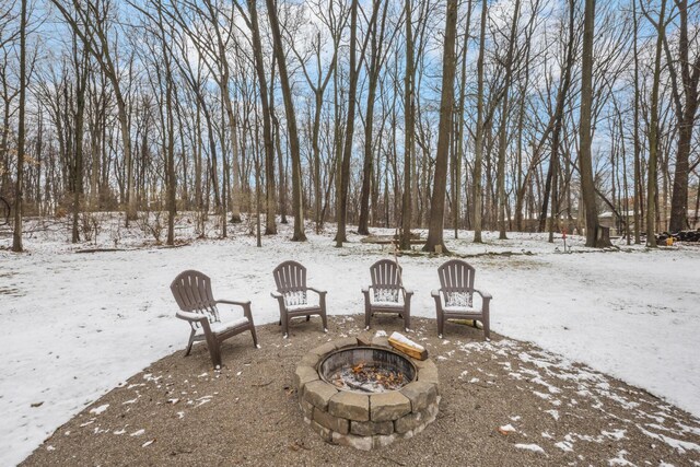 view of patio with a fire pit