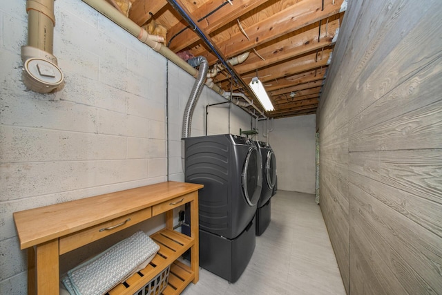 washroom featuring washer and dryer and laundry area