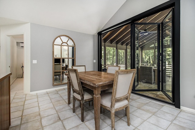 5410 Oak Ridge Rd, Ludington, MI 49431 - dining room with baseboards and vaulted ceiling