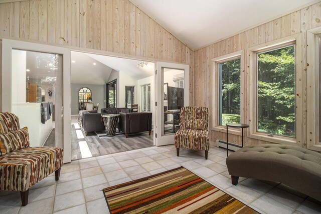 5410 Oak Ridge Rd, Ludington, MI 49431 - sunroom / solarium featuring baseboard heating and plenty of natural light