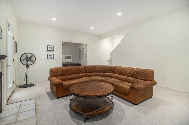 5410 Oak Ridge Rd, Ludington, MI 49431 - carpeted living area with baseboards, recessed lighting, and a glass covered fireplace