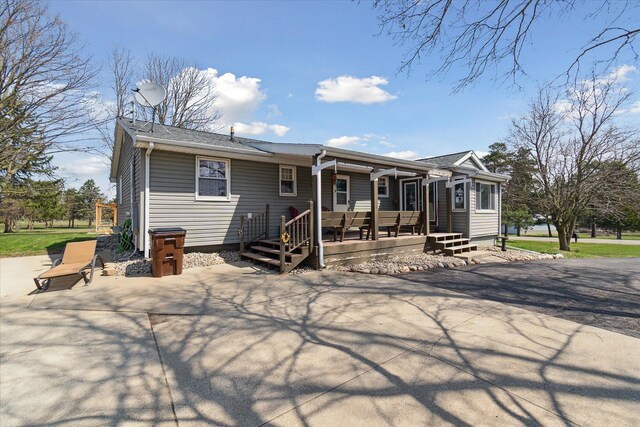 846 Morton Rd, Horton, MI 49246 - back of house featuring driveway