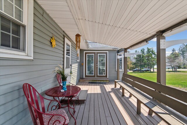 846 Morton Rd, Horton, MI 49246 - deck with covered porch and a lawn