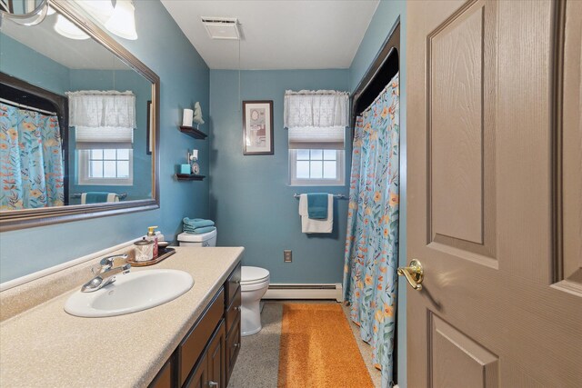 846 Morton Rd, Horton, MI 49246 - full bath with vanity, baseboard heating, visible vents, and toilet