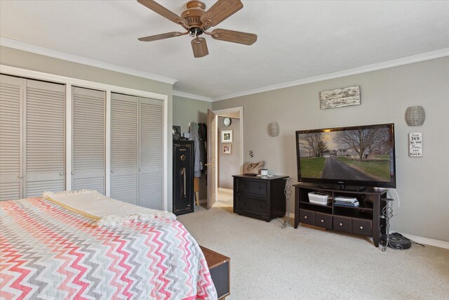 846 Morton Rd, Horton, MI 49246 - bedroom featuring crown molding, a ceiling fan, carpet floors, multiple closets, and baseboards