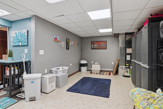 846 Morton Rd, Horton, MI 49246 - interior space with a paneled ceiling and baseboards