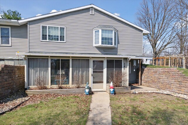 846 Morton Rd, Horton, MI 49246 - view of front of home with fence and a sunroom