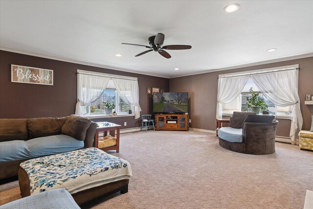 846 Morton Rd, Horton, MI 49246 - carpeted living area featuring a baseboard heating unit, ceiling fan, ornamental molding, and recessed lighting