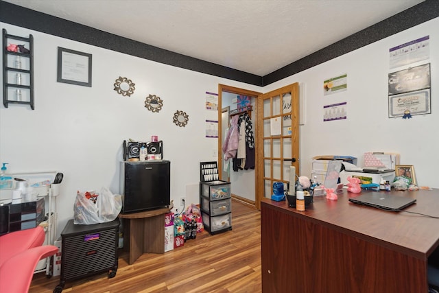 office area featuring wood finished floors