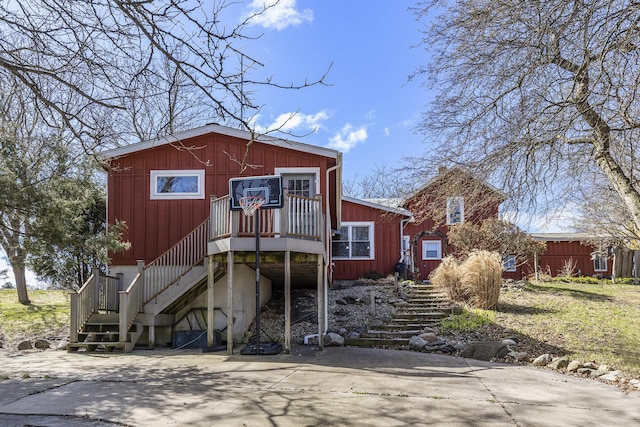 view of front of house with stairs