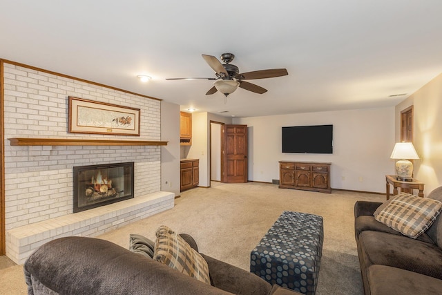 10159 E Rivershore Dr SE, Alto, MI 49302 - living room with light colored carpet, ceiling fan, baseboards, and a fireplace