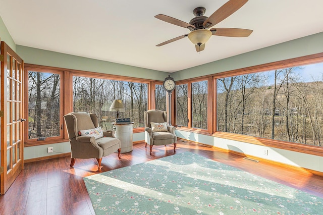 10159 E Rivershore Dr SE, Alto, MI 49302 - sunroom / solarium featuring wood-type flooring, visible vents, and plenty of natural light