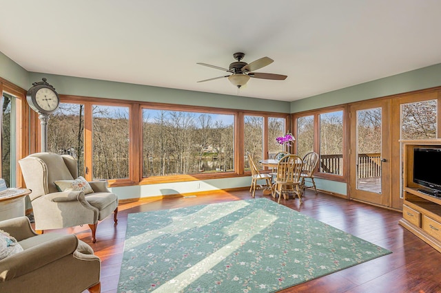 10159 E Rivershore Dr SE, Alto, MI 49302 - sunroom / solarium with wood finished floors