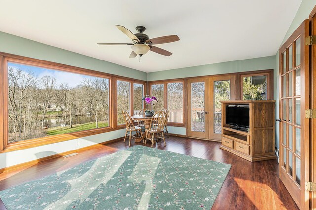 10159 E Rivershore Dr SE, Alto, MI 49302 - sunroom / solarium with french doors and a healthy amount of sunlight