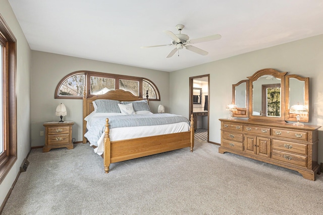 10159 E Rivershore Dr SE, Alto, MI 49302 - bedroom featuring baseboards, carpet, multiple windows, and ensuite bath