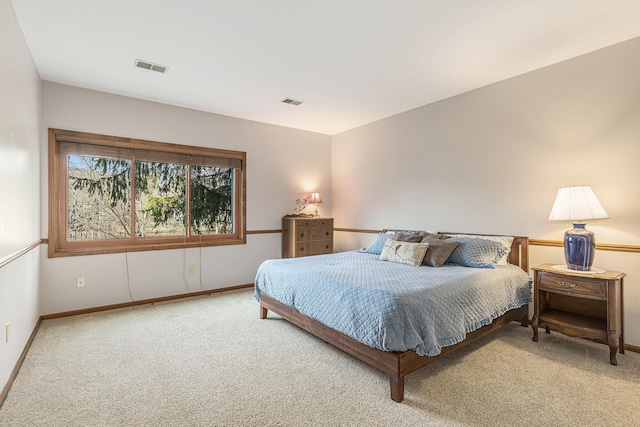 10159 E Rivershore Dr SE, Alto, MI 49302 - bedroom with visible vents, baseboards, and carpet flooring