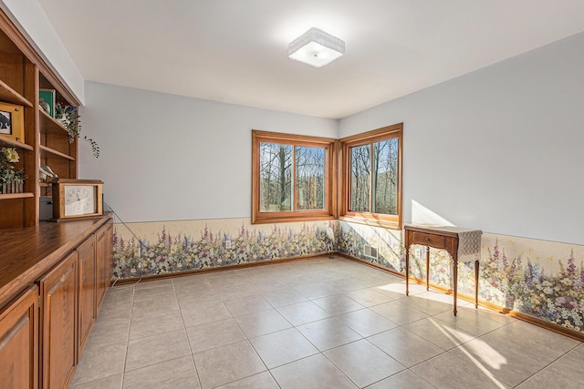 10159 E Rivershore Dr SE, Alto, MI 49302 - interior space featuring baseboards and light tile patterned flooring