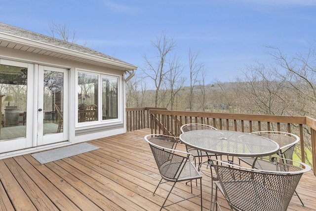 10159 E Rivershore Dr SE, Alto, MI 49302 - wooden deck with outdoor dining space