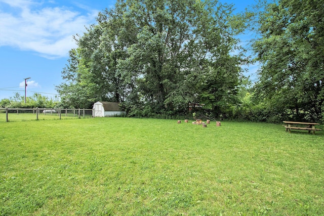 3316 W Lemon Creek Rd, Bridgman, MI 49106 - view of yard featuring a storage unit and an outdoor structure