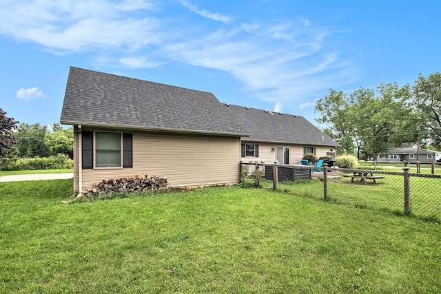3316 W Lemon Creek Rd, Bridgman, MI 49106 - rear view of property with roof with shingles