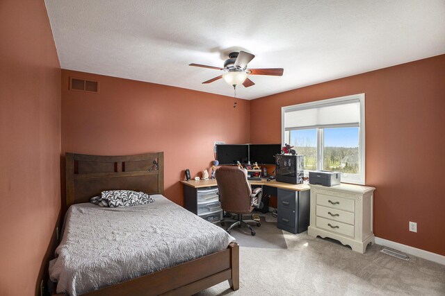 17 Coronado Dr, Jackson, MI 49201 - bedroom featuring light carpet, baseboards, a ceiling fan, and visible vents