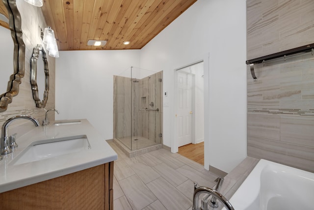 full bath with a shower stall, wooden ceiling, a sink, and a washtub