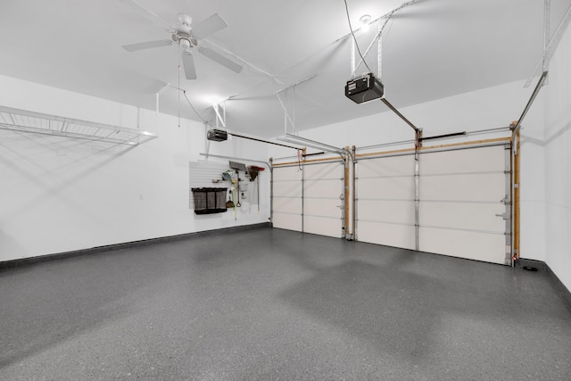 garage with a ceiling fan and a garage door opener