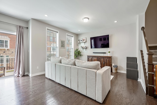 living area with stairway, baseboards, dark wood-style flooring, and recessed lighting