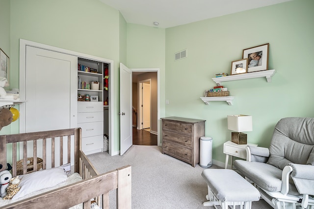 bedroom with high vaulted ceiling, carpet floors, visible vents, and baseboards