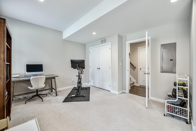 workout area with electric panel, carpet floors, baseboards, visible vents, and recessed lighting