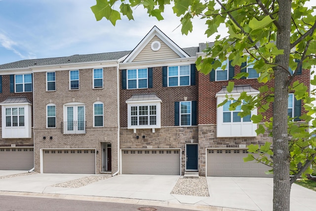 2825 Ridington Rd, Ann Arbor, MI 48105 - view of property with driveway and an attached garage