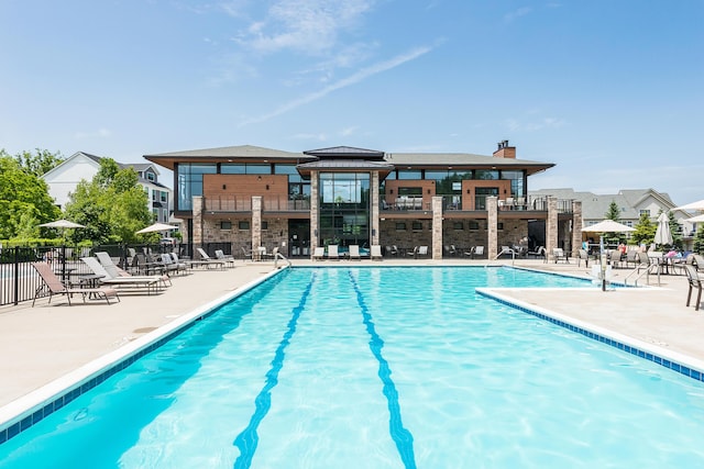 2825 Ridington Rd, Ann Arbor, MI 48105 - community pool featuring a patio