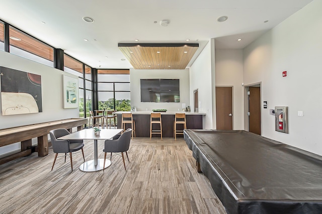 2825 Ridington Rd, Ann Arbor, MI 48105 - recreation room with expansive windows, light wood-style flooring, recessed lighting, and pool table