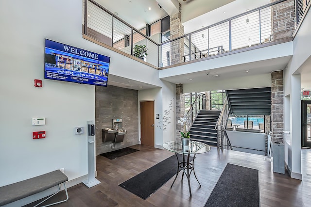 2825 Ridington Rd, Ann Arbor, MI 48105 - entrance foyer with a towering ceiling, wood finished floors, and stairway