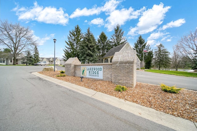 community sign with a residential view