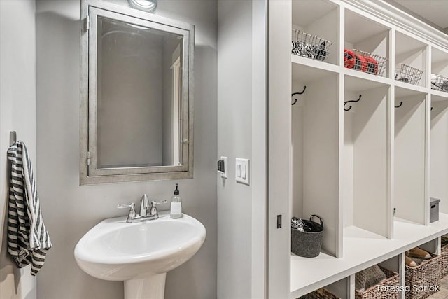 mudroom featuring a sink
