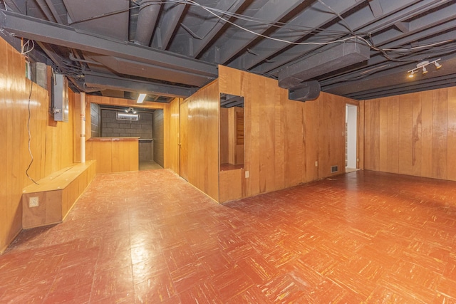 finished basement with wood walls
