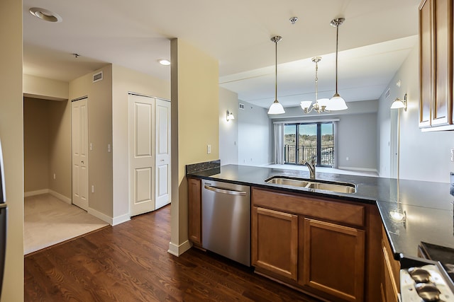 kitchen featuring dark wood finished floors, visible vents, stainless steel dishwasher, a sink, and brown cabinetry