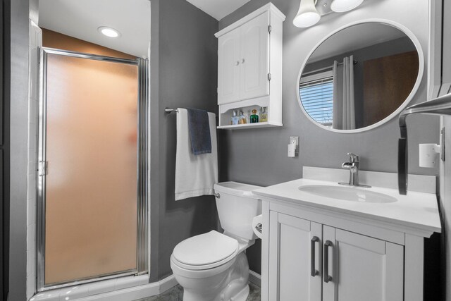 16264 White Haven Dr, Northville, MI 48168 - full bathroom featuring vanity, recessed lighting, toilet, a stall shower, and baseboards