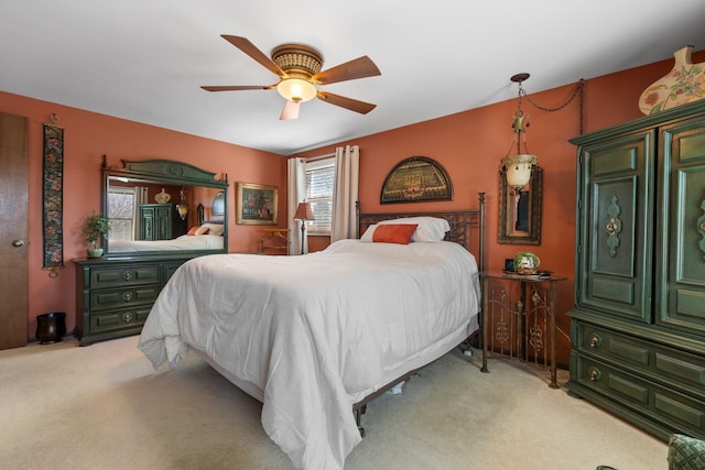 16264 White Haven Dr, Northville, MI 48168 - bedroom with light carpet and a ceiling fan