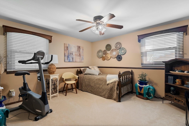 16264 White Haven Dr, Northville, MI 48168 - bedroom with carpet flooring, baseboards, and ceiling fan