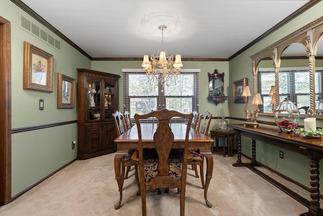 16264 White Haven Dr, Northville, MI 48168 - dining space featuring visible vents, light colored carpet, a notable chandelier, and a healthy amount of sunlight