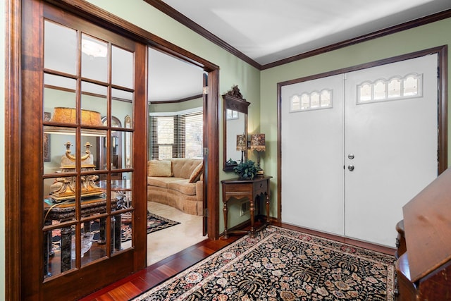 16264 White Haven Dr, Northville, MI 48168 - foyer with ornamental molding, baseboards, and wood finished floors