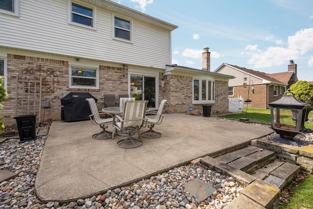 16264 White Haven Dr, Northville, MI 48168 - view of patio / terrace featuring outdoor dining space, a gazebo, and grilling area