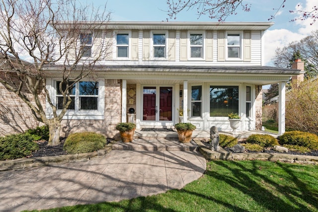 16264 White Haven Dr, Northville, MI 48168 - view of front of home featuring covered porch